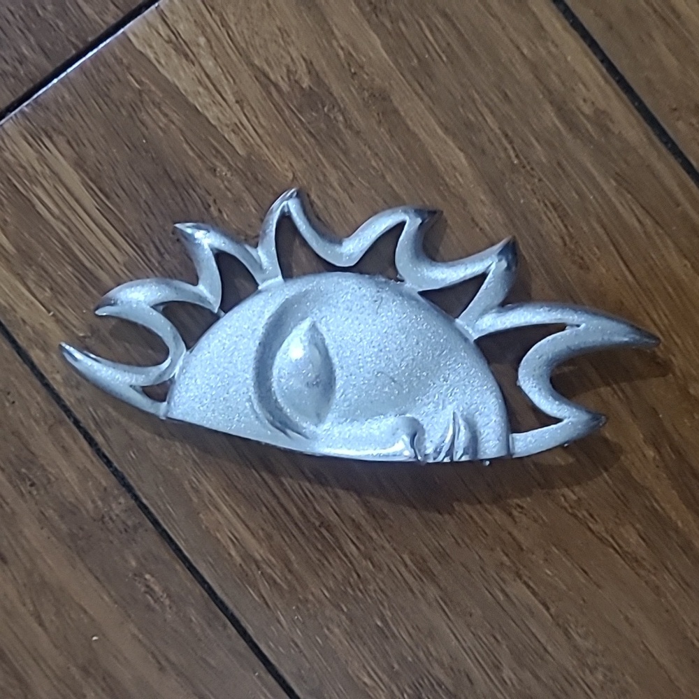 Vintage silver tone half sun face brooch/pin.